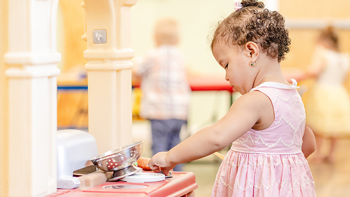 little girl in toddler nursery