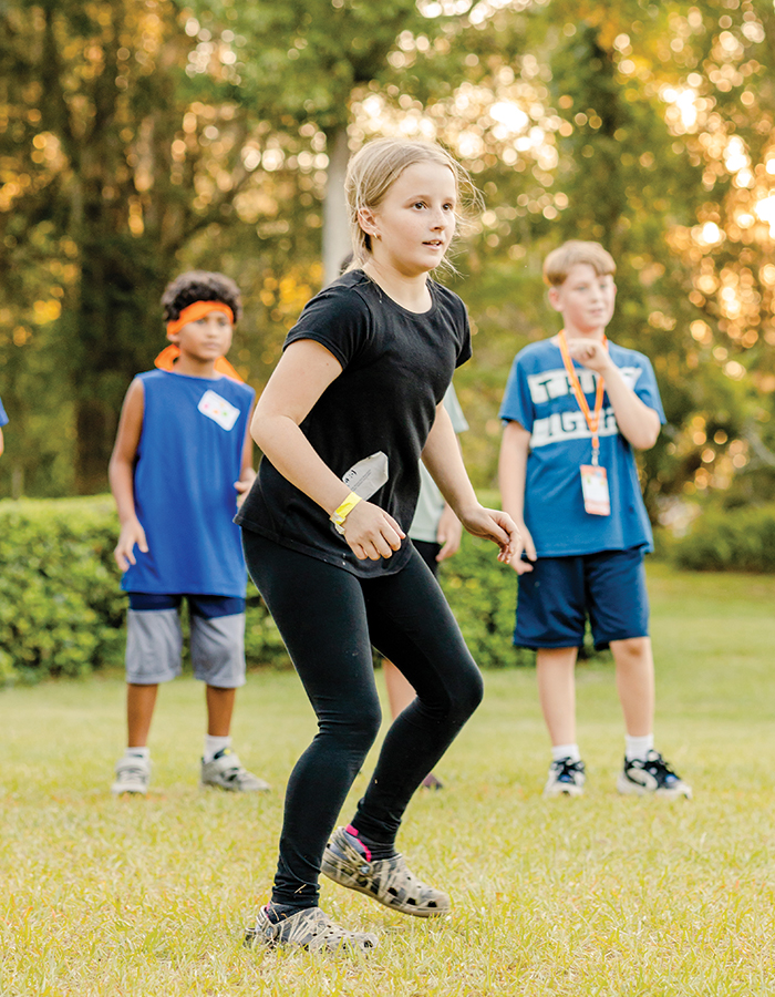 girl playing an outdoor game